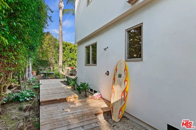a living room with furniture or couch and a flat screen tv