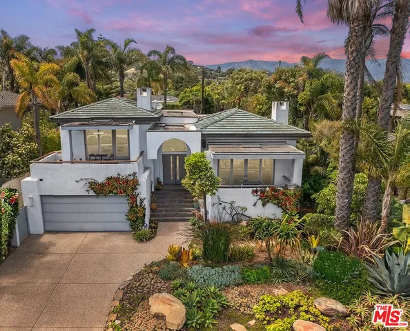 a view of a kitchen with washer and dryer