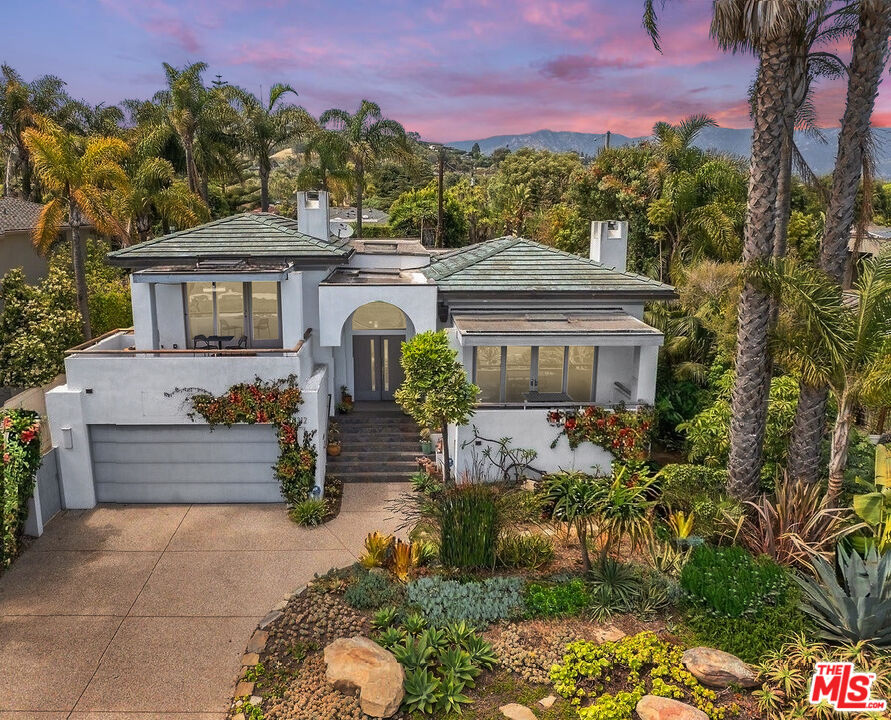 1312 Shoreline Drive Santa Barbara, CA 93109 - Photo 45 of 67 a front view of a house with a garden