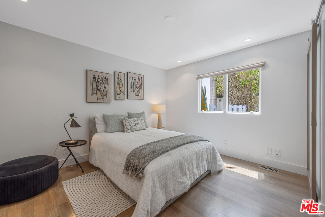 1312 Shoreline Drive Santa Barbara, CA 93109 - Photo 48 of 67 a bedroom with a bed and a couch