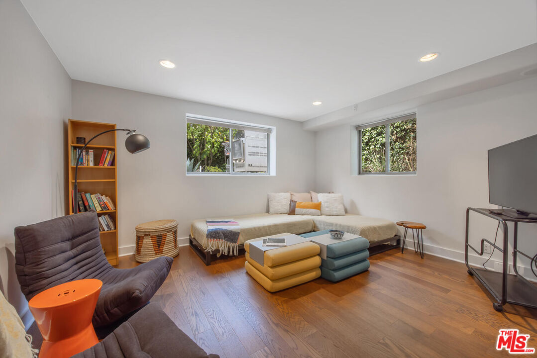 1312 Shoreline Drive Santa Barbara, CA 93109 - Photo 53 of 67 a living room with furniture or couch and a flat screen tv