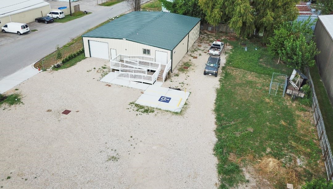 an aerial view of residential house with outdoor space