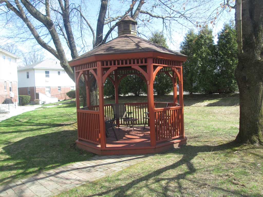 119 Colonial Circle, Unit B Chicopee, MA 01020 - Photo 17 of 17 a view of a park with a large trees