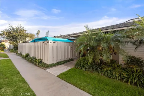 a view of a backyard with plants
