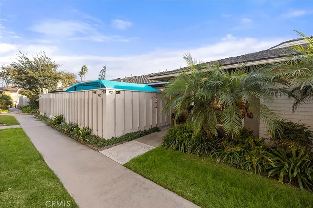 a view of a backyard with plants