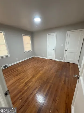 an empty room with windows