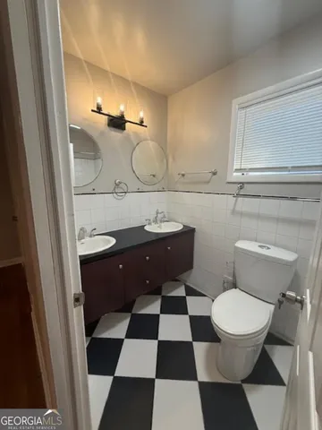 a bathroom with a sink and a toilet