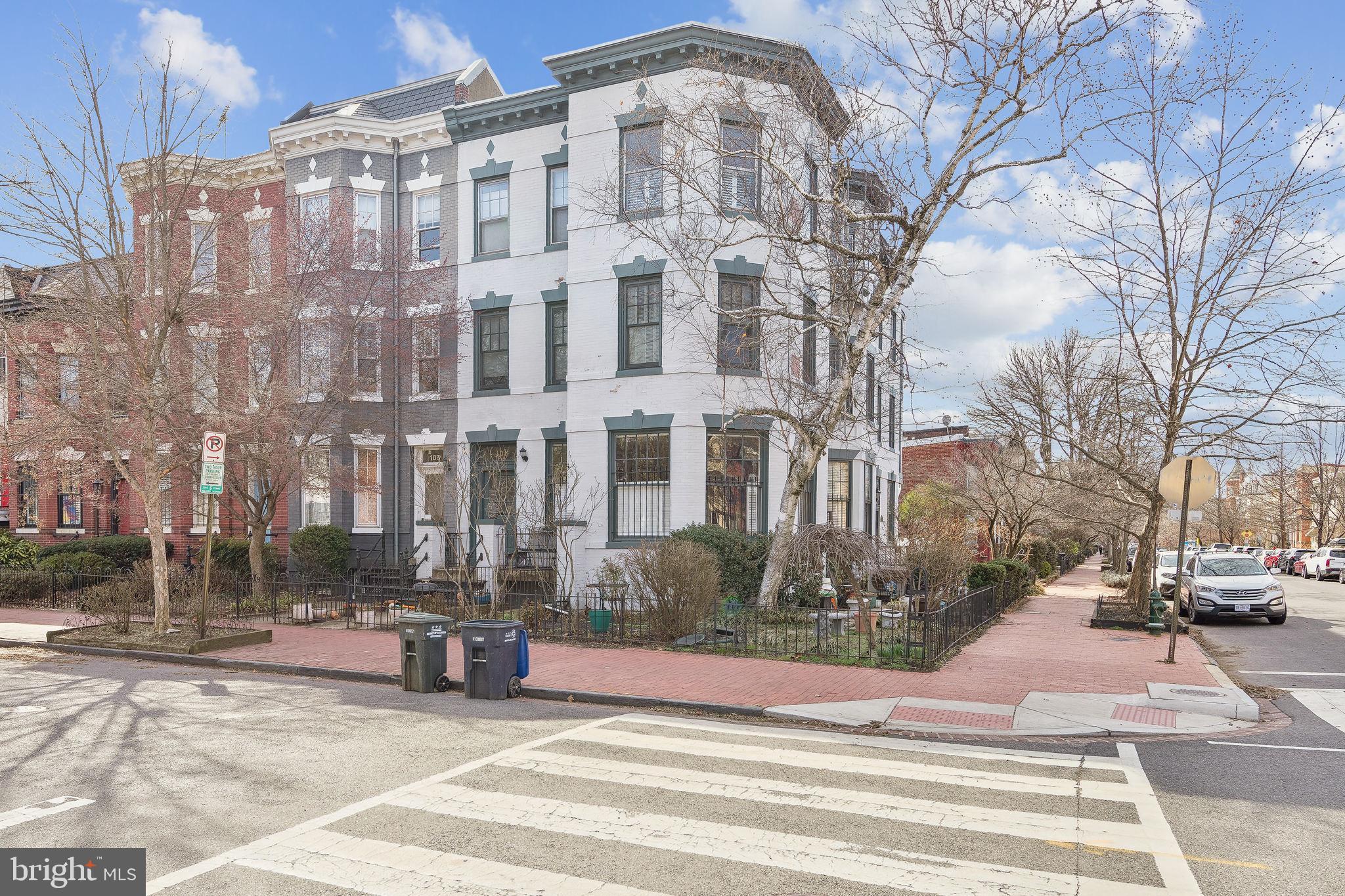 101 7th Street Southeast, Unit 4 Washington, DC 20003 - Photo 1 of 13 a view of a building with a yard