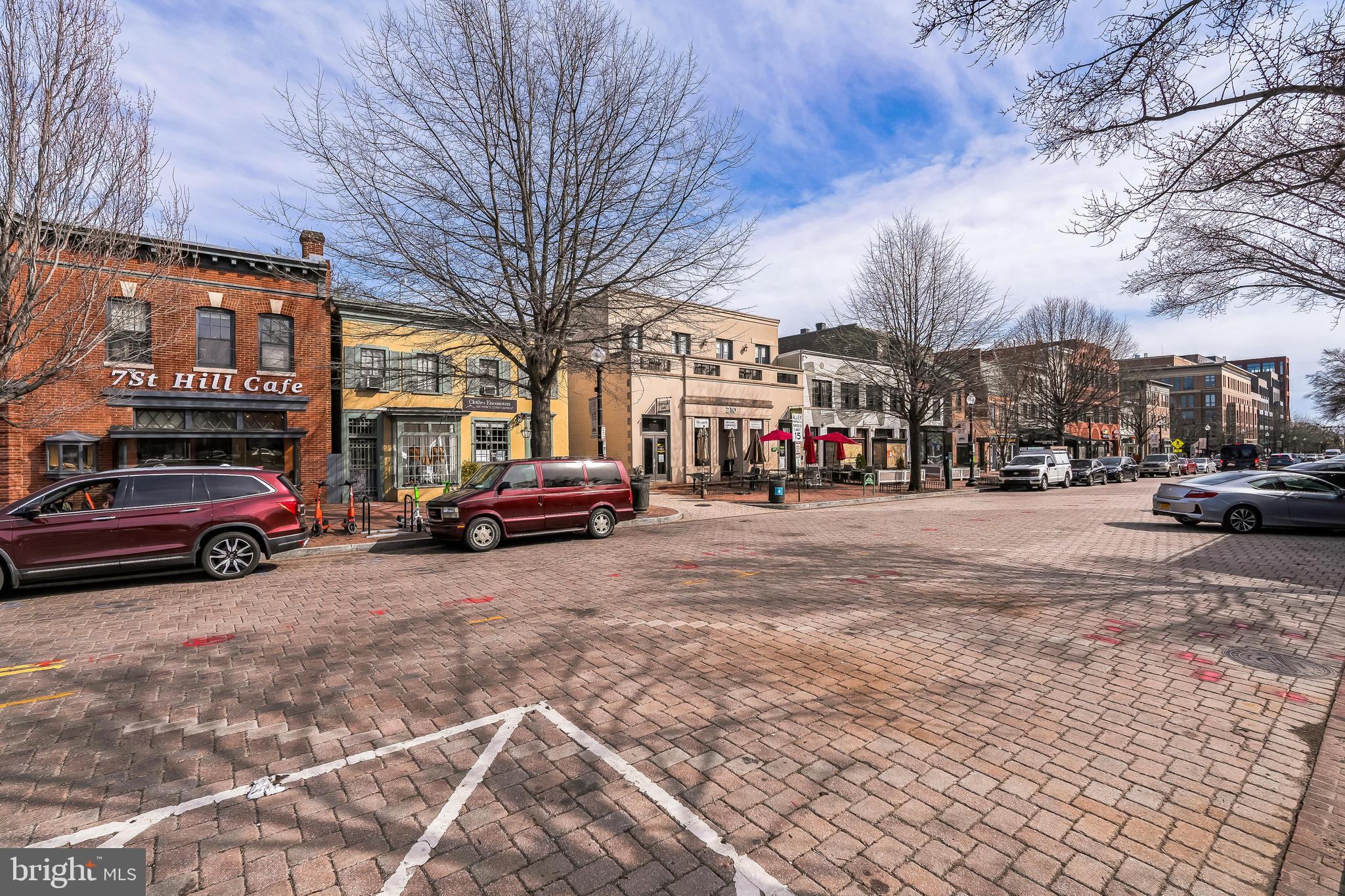 101 7th Street Southeast, Unit 4 Washington, DC 20003 - Photo 11 of 13 a building with trees in front of it