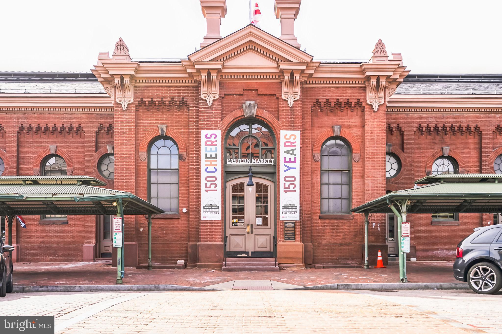 101 7th Street Southeast, Unit 4 Washington, DC 20003 - Photo 12 of 13 a front view of a building with parking space