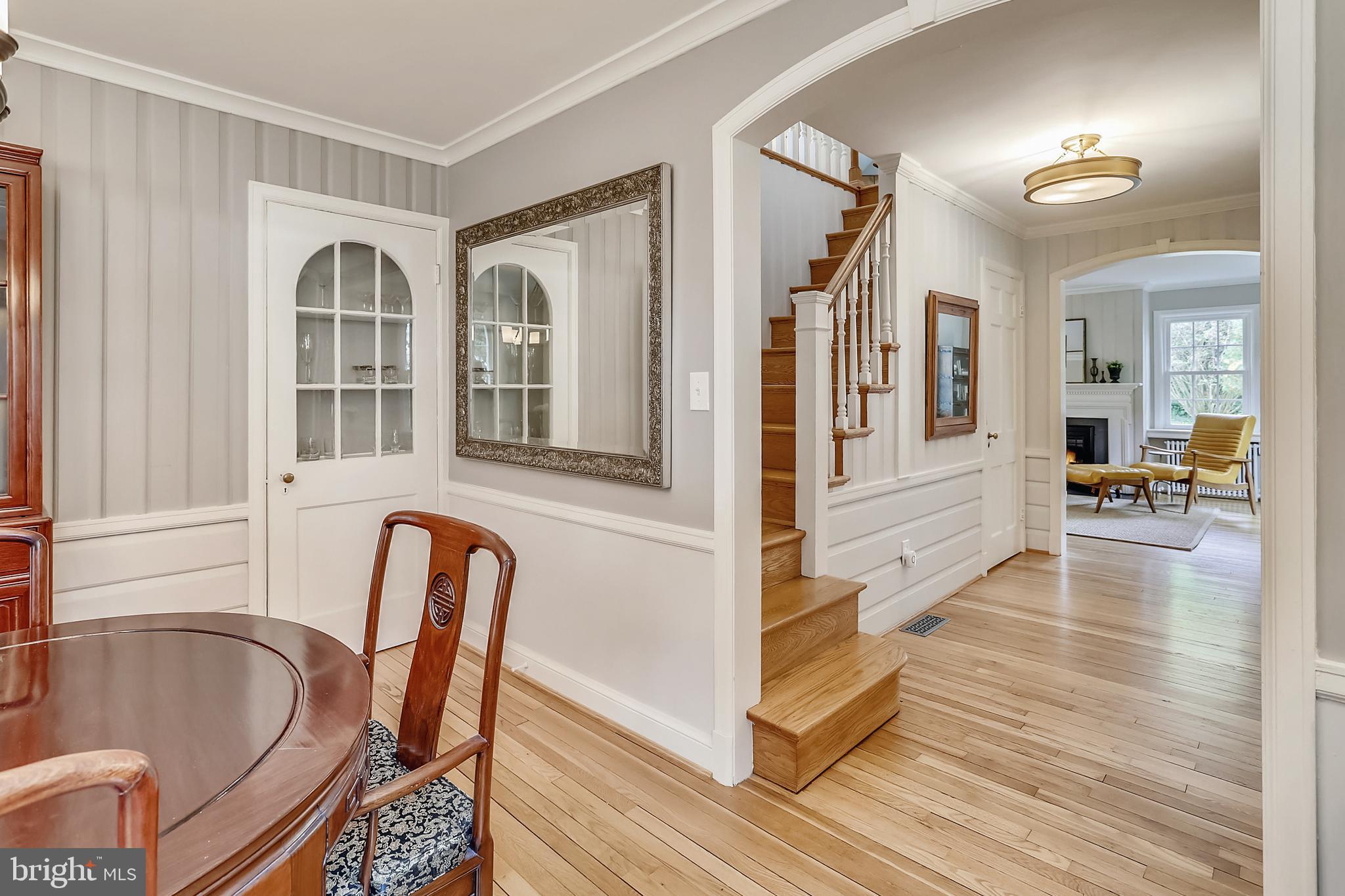 3114 Russell Road Alexandria, VA 22305 - Photo 16 of 72 View of the stairs and foyer from dining room