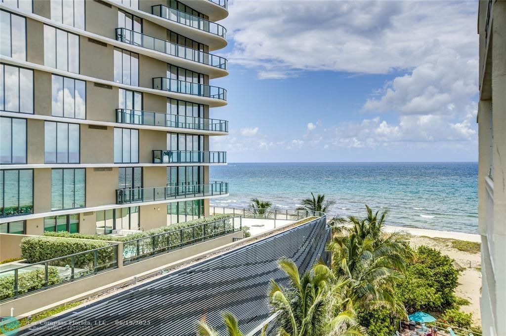 710 North Ocean Boulevard, Unit 1203 Pompano Beach, FL 33062 - Photo 17 of 23 a view of a city from a balcony with potted plants