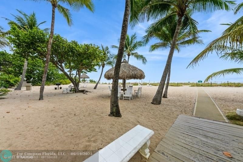 710 North Ocean Boulevard, Unit 1203 Pompano Beach, FL 33062 - Photo 19 of 23 a view of a park with palm trees