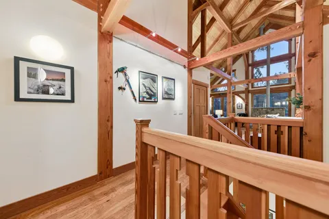 a view of a balcony and wooden floor