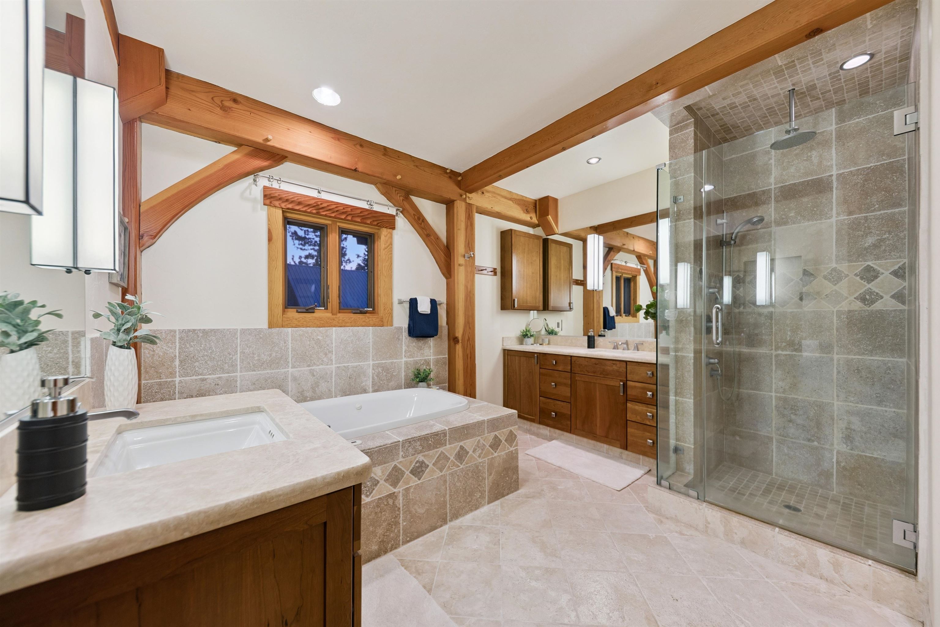 15075 Wolfgang Road Truckee, CA 96161 - Photo 19 of 28 a bathroom with a sink double vanity and a shower
