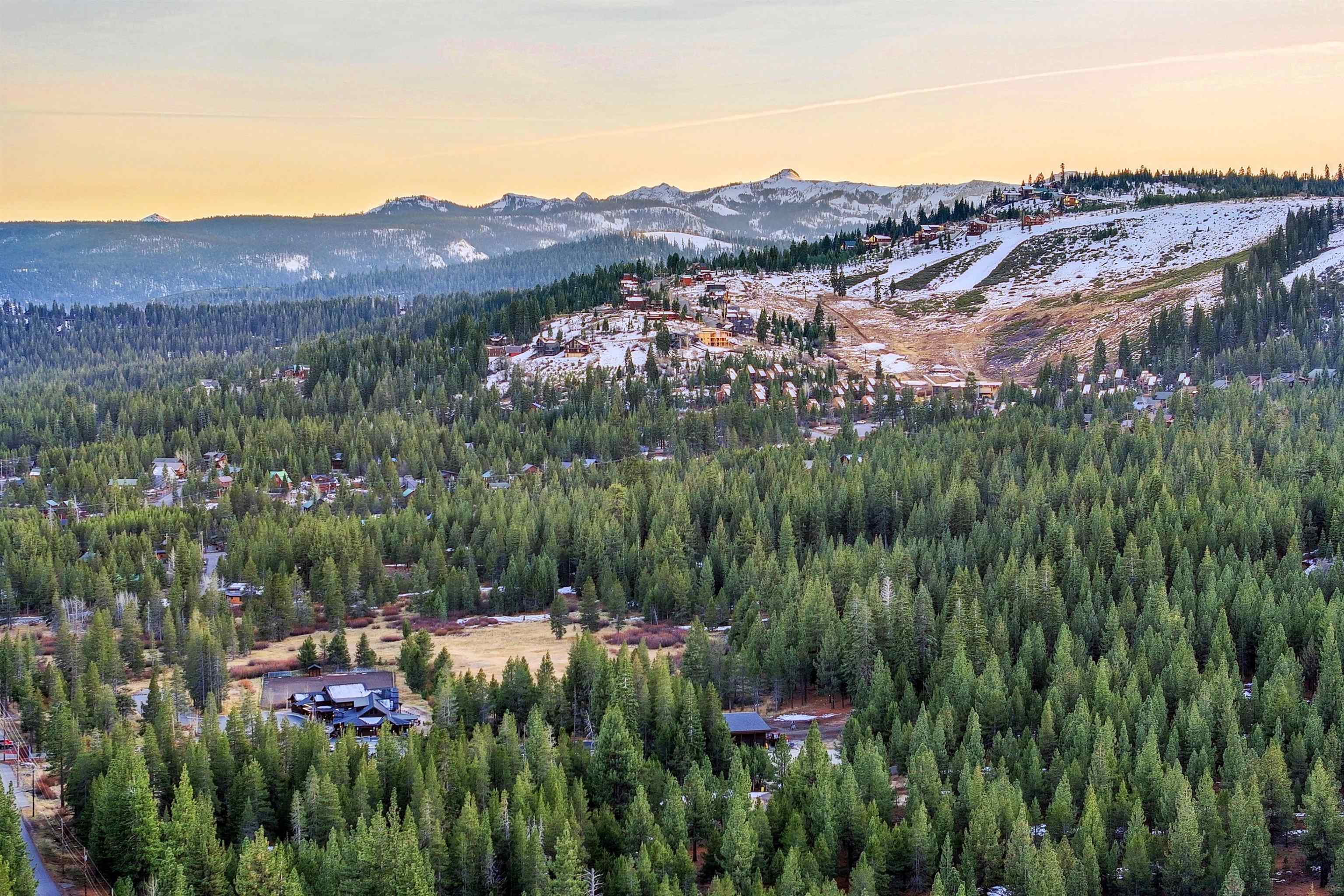 15075 Wolfgang Road Truckee, CA 96161 - Photo 28 of 28 a view of a lush green hillside and a houses