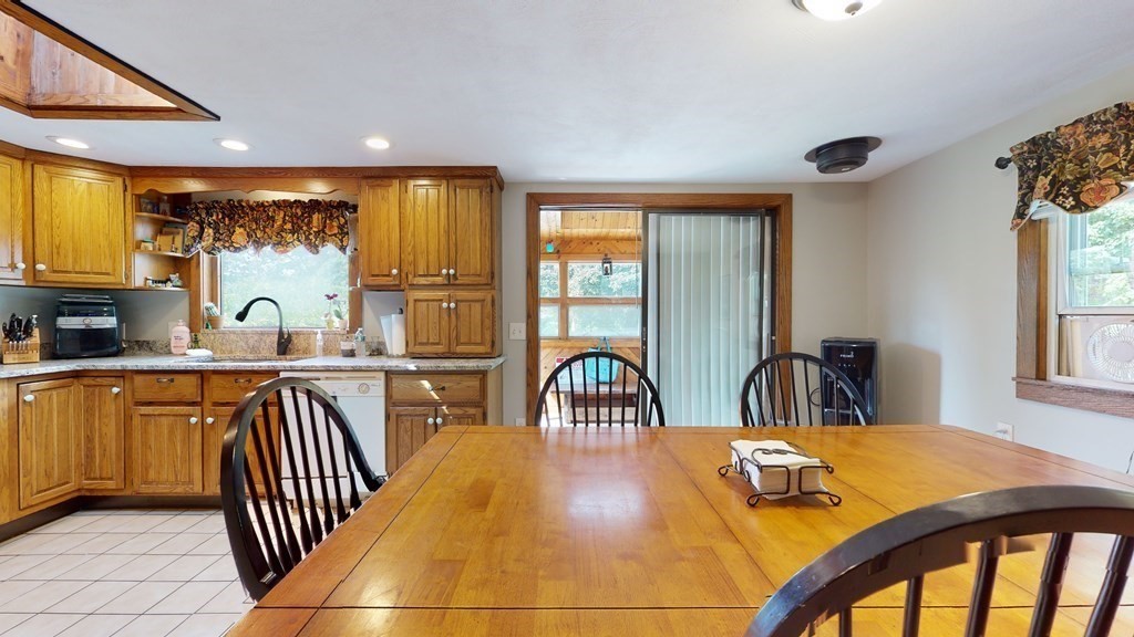 25 Charlton Road Dudley, MA 01571 - Photo 14 of 42 a very nice looking dining room with a large window