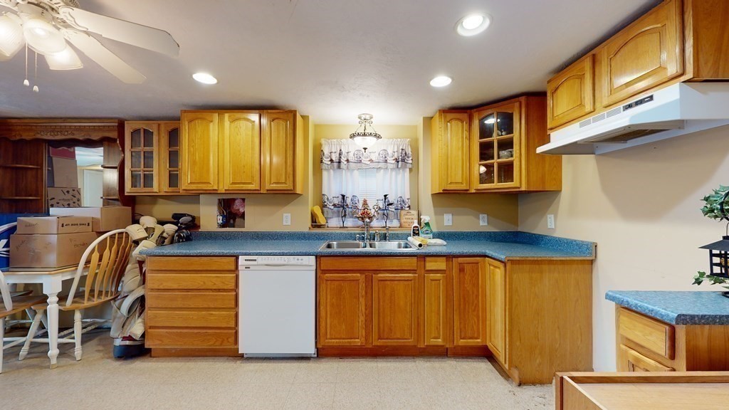 25 Charlton Road Dudley, MA 01571 - Photo 31 of 42 a kitchen that has a lot of cabinets in it