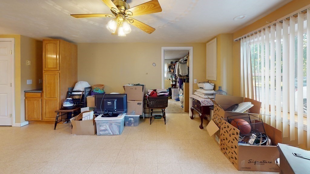 25 Charlton Road Dudley, MA 01571 - Photo 34 of 42 a living room with furniture and a large window