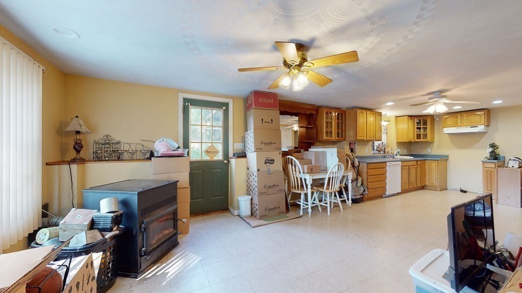25 Charlton Road Dudley, MA 01571 - Photo 36 of 42 a view of a livingroom with furniture and a ceiling fan