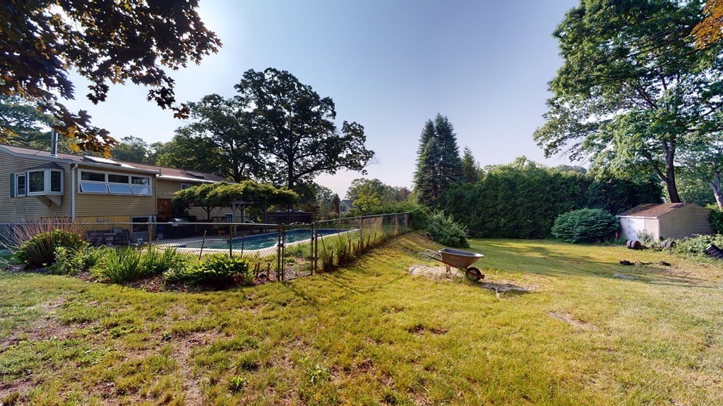 25 Charlton Road Dudley, MA 01571 - Photo 7 of 42 a view of a house with swimming pool