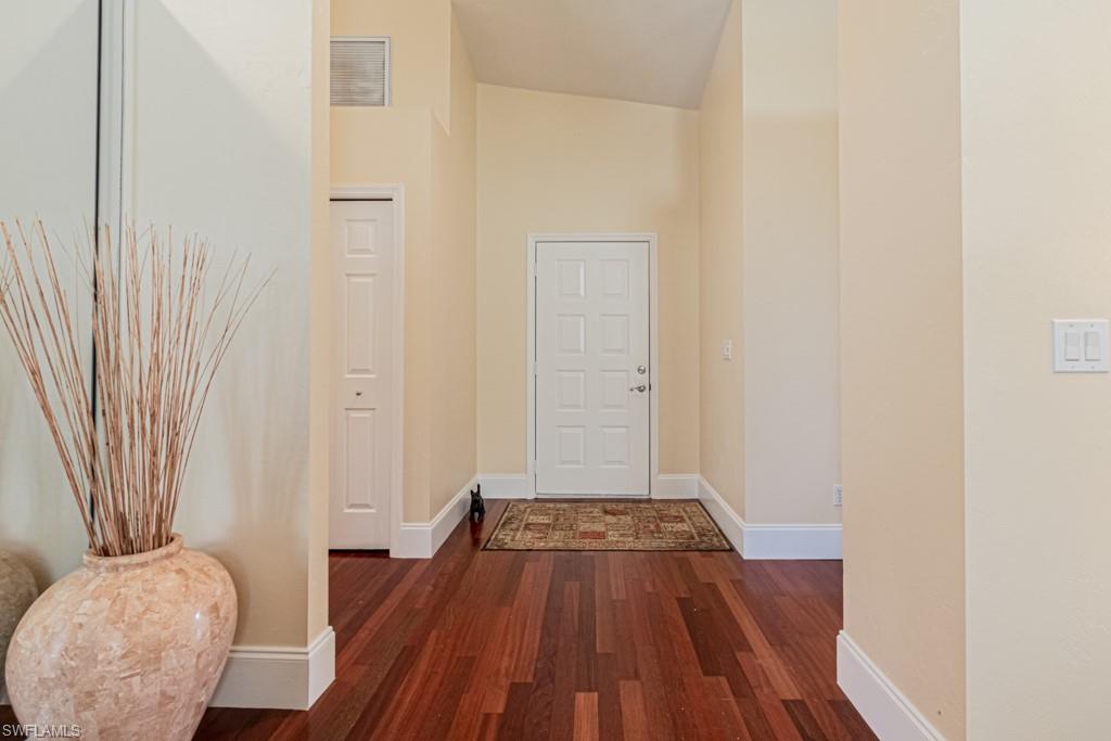248 St James Way Naples, FL 34104 - Photo 2 of 34 wooden floor in a gallery