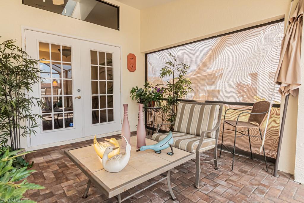248 St James Way Naples, FL 34104 - Photo 27 of 34 a living room with furniture