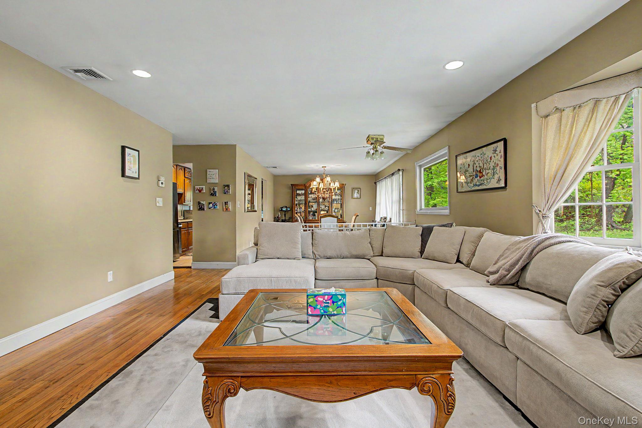 26 Garden Road Mahopac, NY 10541 - Photo 11 of 30 a living room with furniture and a table