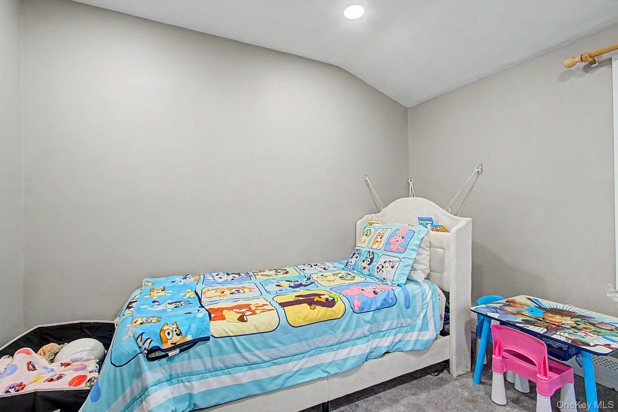 26 Garden Road Mahopac, NY 10541 - Photo 16 of 30 a bedroom with a bed and a window in it