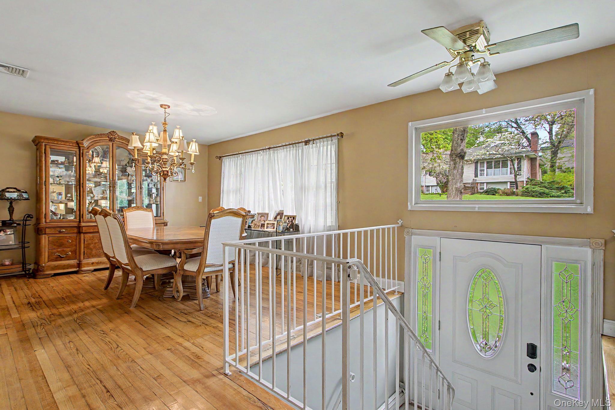 26 Garden Road Mahopac, NY 10541 - Photo 2 of 30 a view of a dining room with furniture window and wooden floor