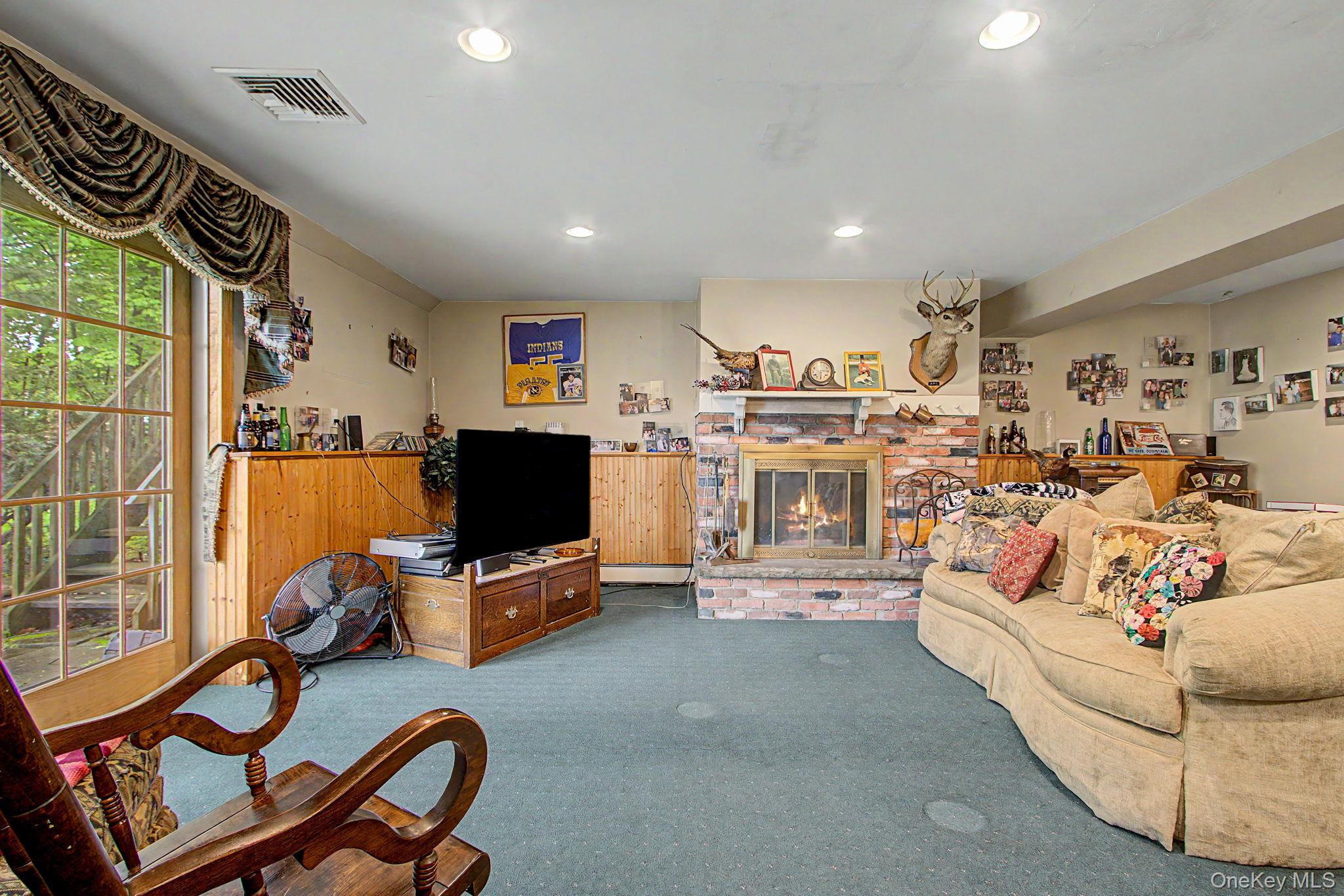 26 Garden Road Mahopac, NY 10541 - Photo 23 of 30 a view of a living room and workspace