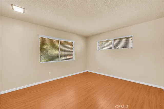a bathroom with a tub a toilet and a sink