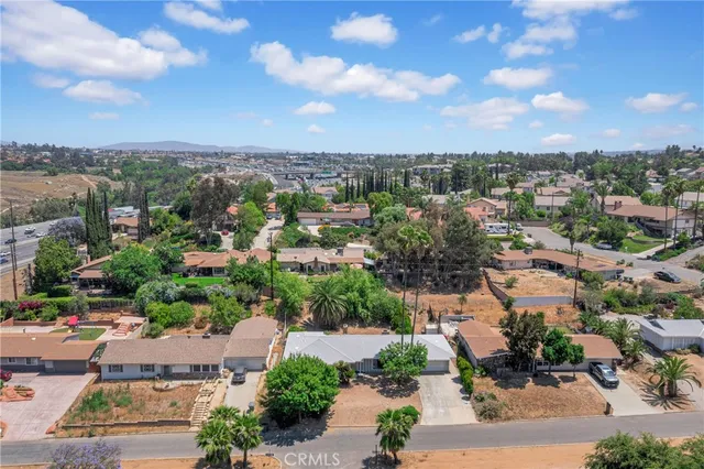 an aerial view of a city with lots of residential buildings