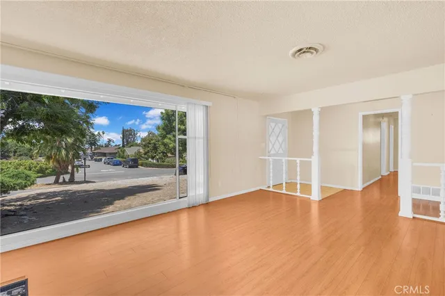 a bedroom with a bed and a fireplace
