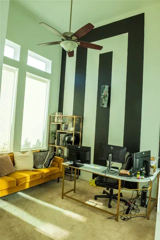 a room with lots of chairs and a table