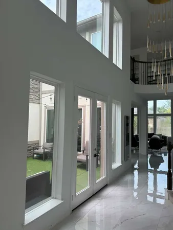 a view of an entryway with a door