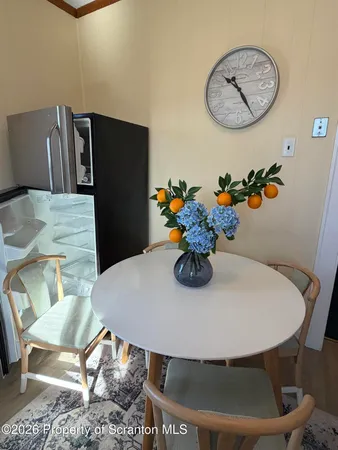 a view of a dining room with furniture