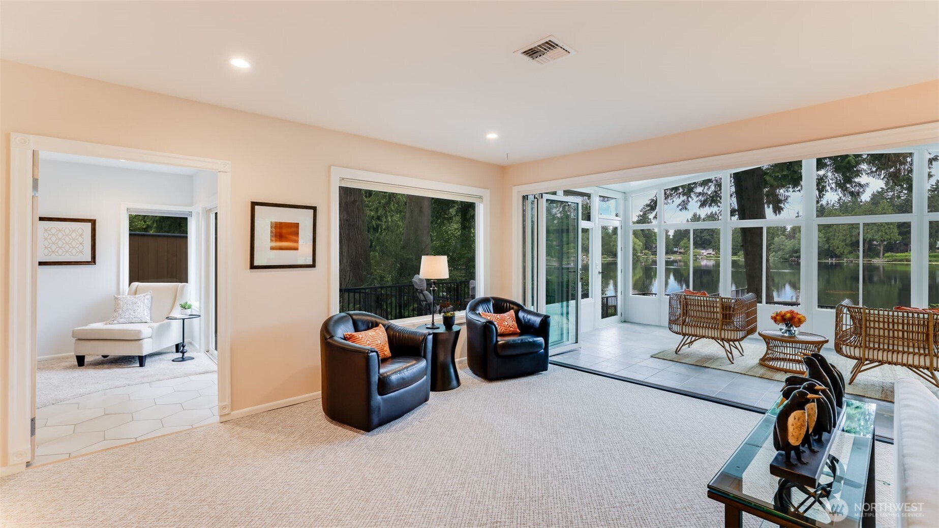 2171 North 122nd Place Seattle, WA 98133 - Photo 11 of 40 a living room with furniture and large windows