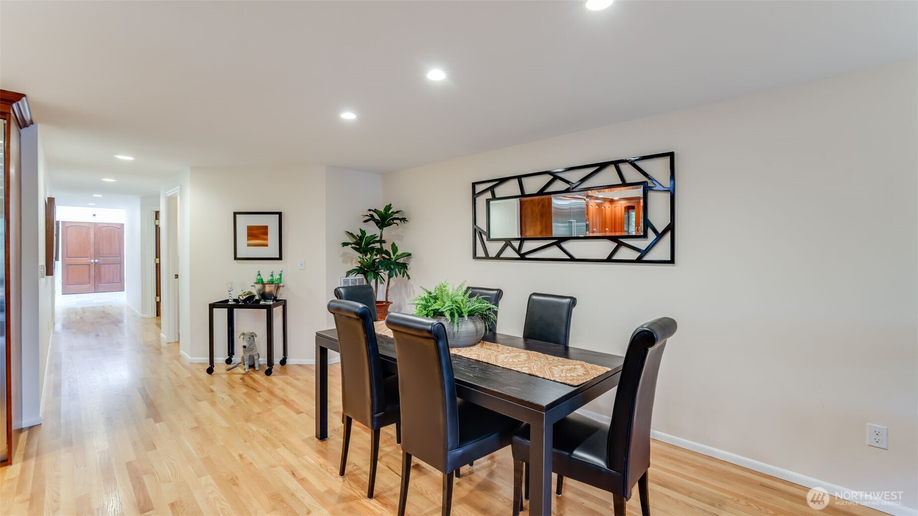 2171 North 122nd Place Seattle, WA 98133 - Photo 19 of 40 a view of a dining room with furniture and wooden floor