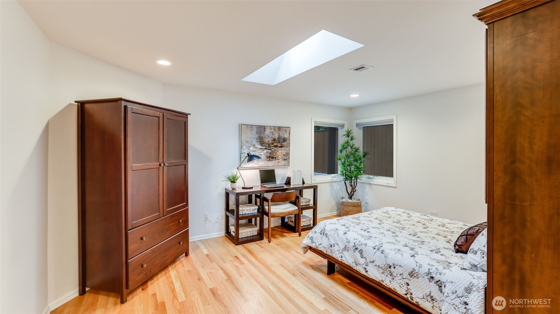 2171 North 122nd Place Seattle, WA 98133 - Photo 24 of 40 a living room with furniture and a wooden floor