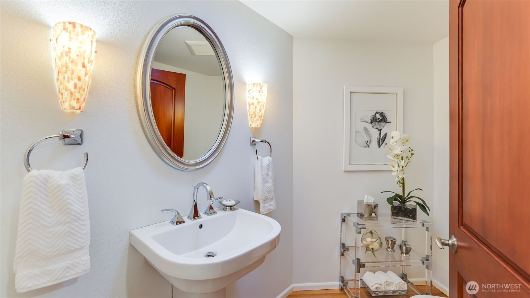 2171 North 122nd Place Seattle, WA 98133 - Photo 26 of 40 a bathroom with a sink and a mirror
