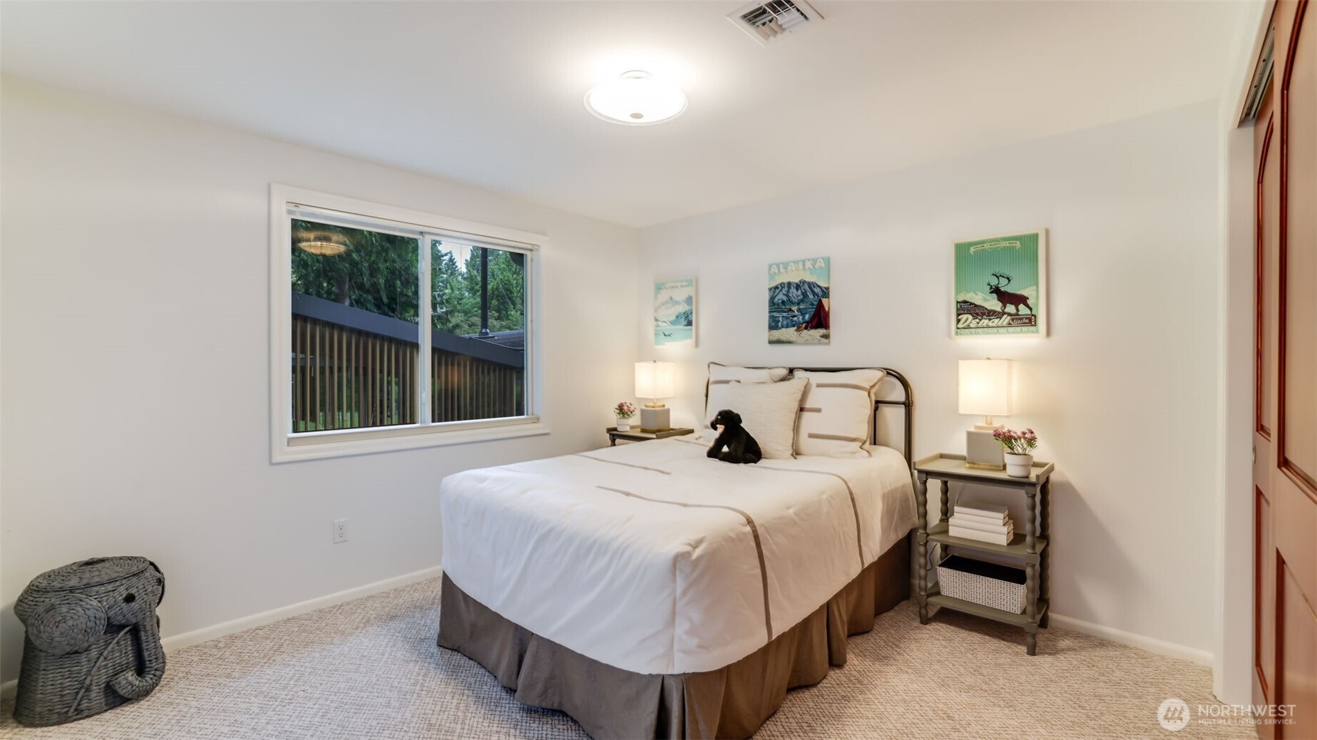 2171 North 122nd Place Seattle, WA 98133 - Photo 28 of 40 a bedroom with a bed and a window