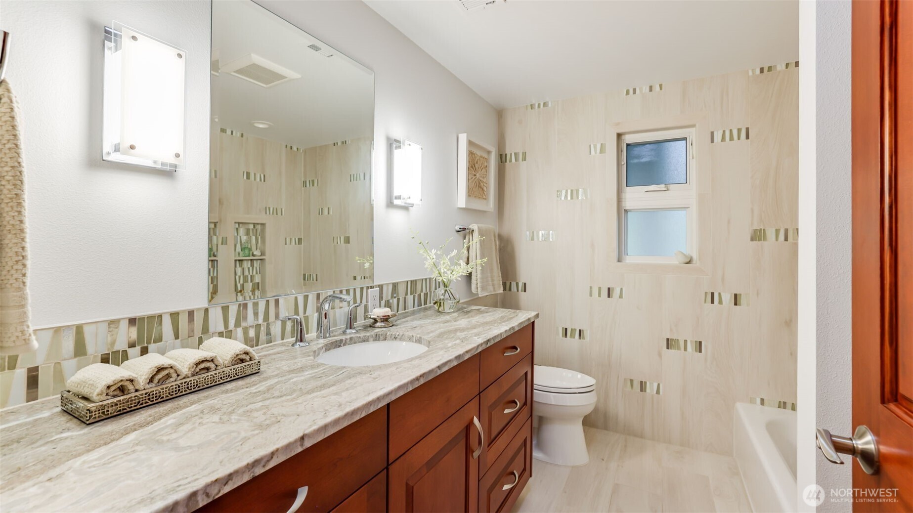 2171 North 122nd Place Seattle, WA 98133 - Photo 29 of 40 a spacious bathroom with a double vanity sink double mirror and toilet