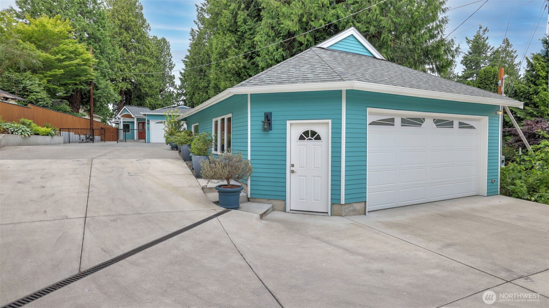 2171 North 122nd Place Seattle, WA 98133 - Photo 33 of 40 a view of a house with a yard and large tree