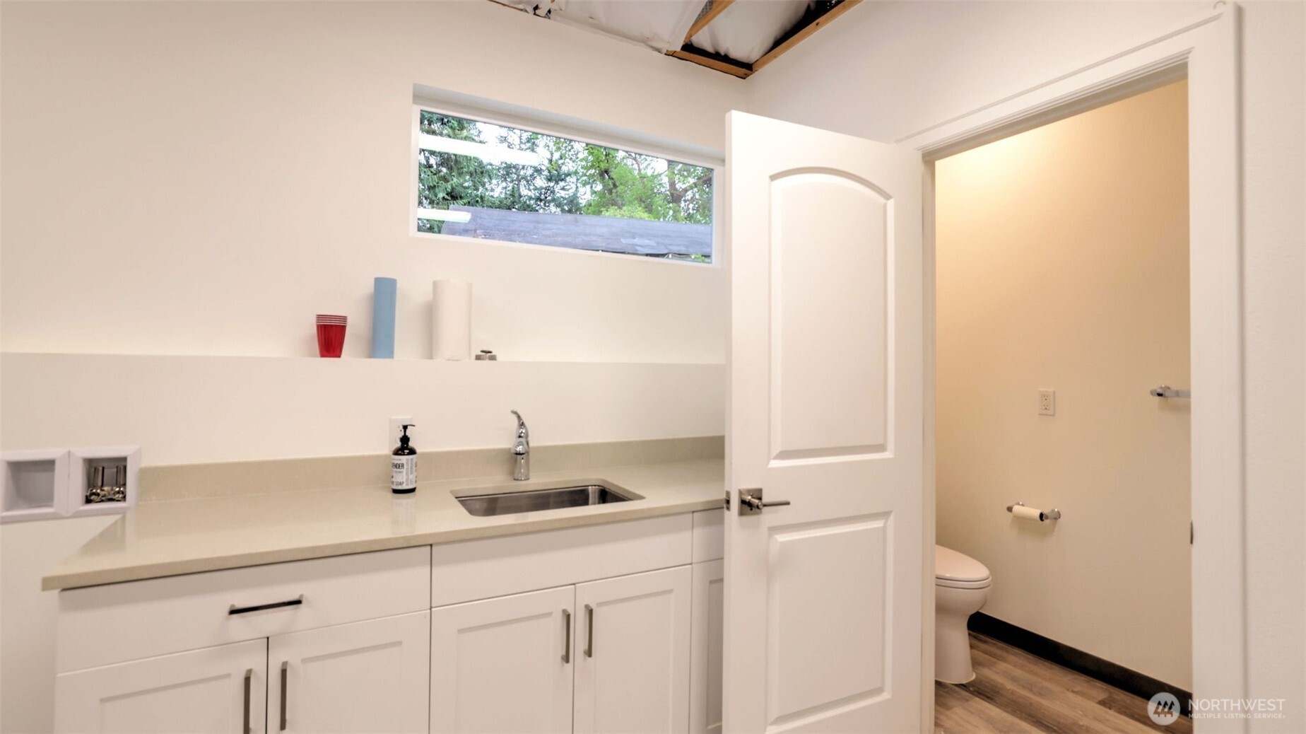 2171 North 122nd Place Seattle, WA 98133 - Photo 35 of 40 a bathroom with a sink and a mirror