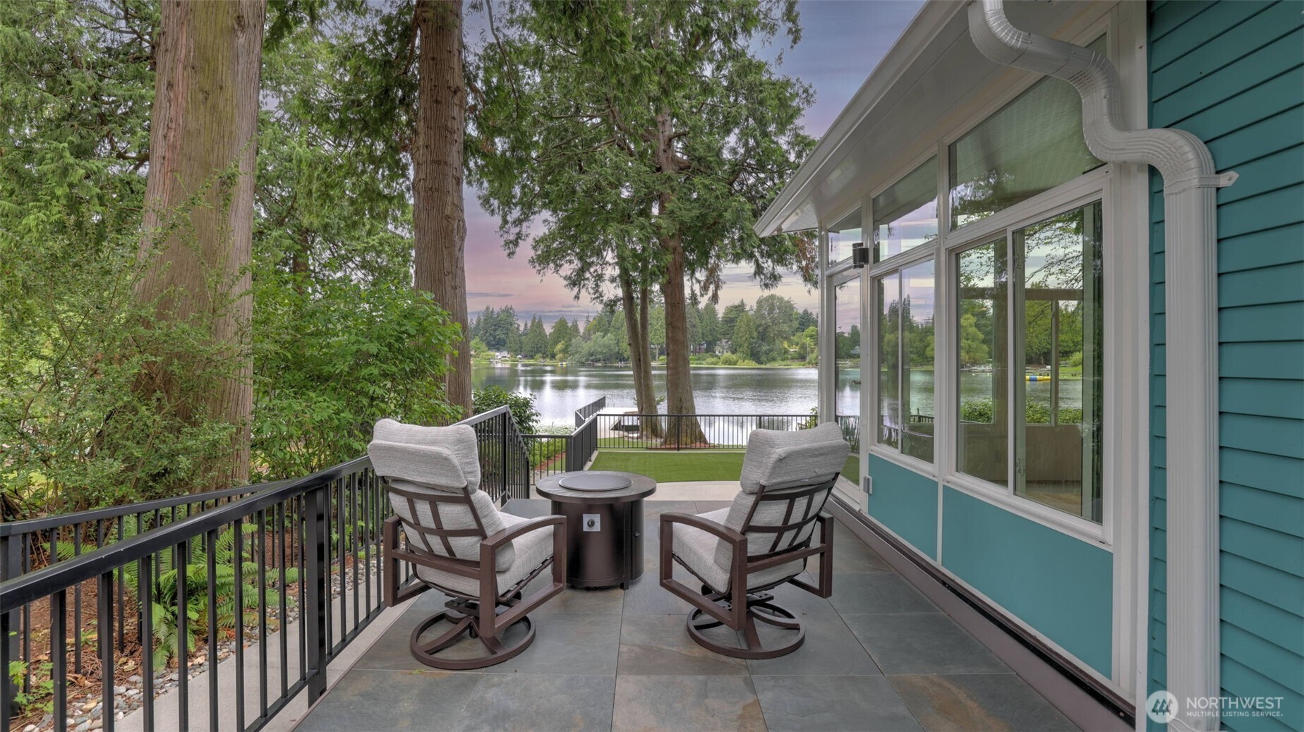 2171 North 122nd Place Seattle, WA 98133 - Photo 37 of 40 a view of a patio with a table chairs and backyard
