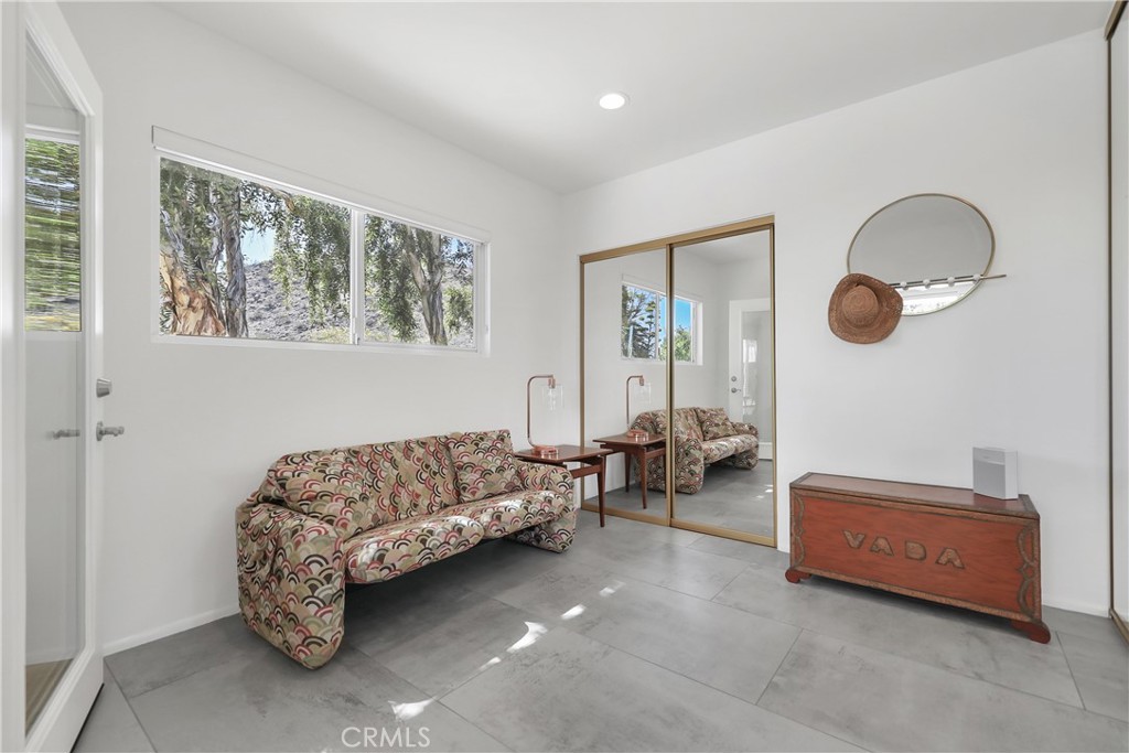 71620 Halgar Road Rancho Mirage, CA 92270 - Photo 17 of 41 a living room with furniture and a window