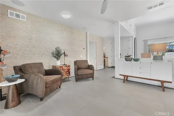 a living room with furniture and a table