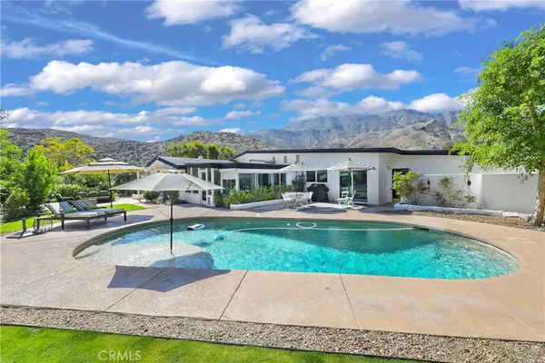 a view of a patio with a garden