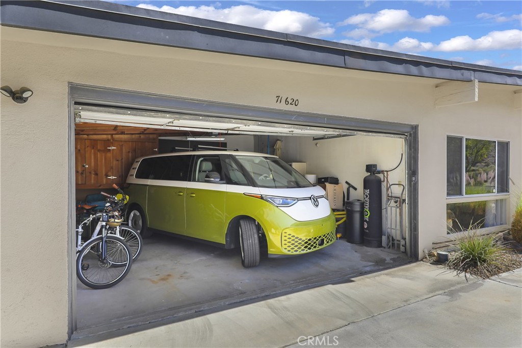 71620 Halgar Road Rancho Mirage, CA 92270 - Photo 36 of 41 a bedroom with a bed and a window